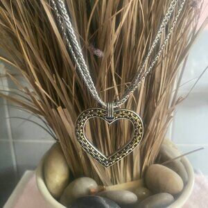 Brighton open heart necklace, gold tone one side, silver tone other side.